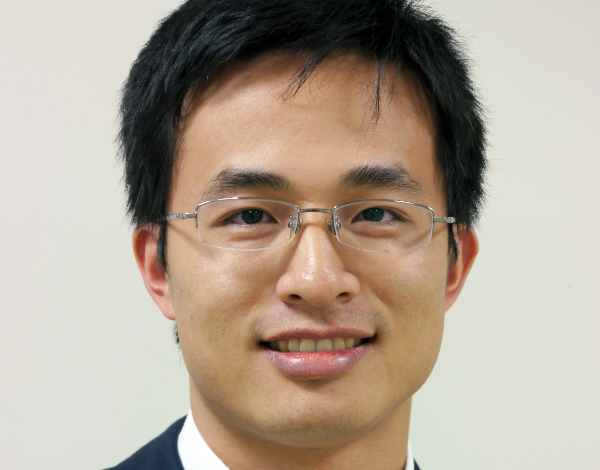 Headshot of Xu Chen, the new BARC director against a white background